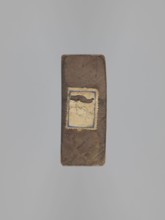 Double-sided gingerbread mold. Obverse: couple holding hands — a woman in a richly decorated long
