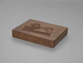 Double-sided gingerbread mould. Rectangular shape, height 25.8 cm, width 19.4 cm, depth 4.3 cm.