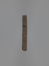 Double-sided gingerbread mould. Obverse: figure of a bearded man in patterned clothes, richly