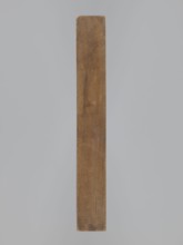 One-sided gingerbread form with the image of a rectangular floral and plant ornament. One-sided