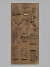 Double-sided gingerbread mould. Obverse: 16 images of various figures; reverse: 12 depictions.