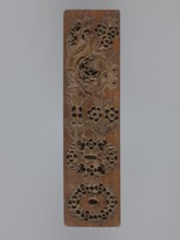 Double-sided gingerbread mould. Oblong rectangular shape. Obverse: 7 floral and plant motifs —