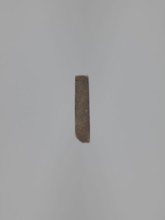 Double-sided gingerbread mould. Obverse: images of four heads that, depending on rotation of the