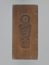 Double-sided gingerbread mold. Obverse: baby in swaddling; Reverse: baby in swaddling. Folk-style