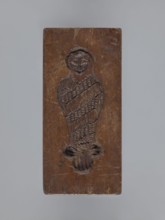 Double-sided gingerbread form. Side A: female figure; Side B: baby in swaddling clothes. Maker