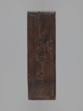 Double-sided gingerbread form. Side A: female figure; Side B: baby in swaddling clothes. Maker
