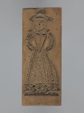 Double-sided gingerbread form. Obverse: female figure in a hat and long patterned dress; Reverse: