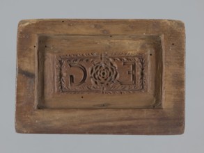 Double-sided gingerbread mould. Oblong rectangular mould; obverse: oval frame containing a