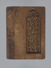 Double-sided gingerbread mould. Obverse: board with letters of the alphabet; reverse: image of a