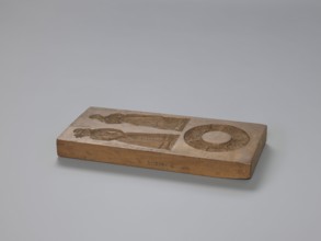 Double-sided gingerbread mould. Obverse: two female figures and a wreath; Reverse: two male figures