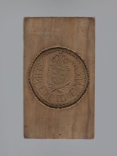 Double-sided gingerbread mould. Obverse: rectangular mould with an oval coat of arms in a