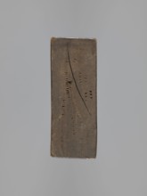 Double-sided gingerbread mold. Obverse: male figure in a high hat and a fur-lined jacket seated on