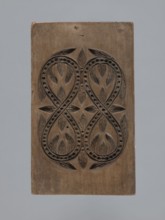 Double-sided gingerbread mould with a plant and floral ornament on both sides;, Gingerbread,