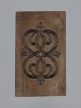 Double-sided gingerbread mould with a plant and floral ornament on both sides;, Materials and