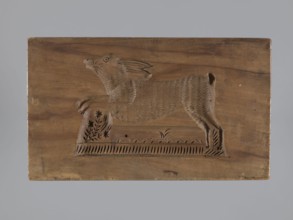 Double-sided gingerbread mold; obverse: sheep, reverse: hare. Woodcarving, folk-style decorations;