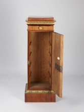 Pedestal cabinet, single-leaf with a drawer at the top, supported by a prominent plinth; veneered