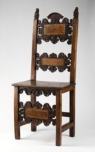 Chair, carved, with a board seat and a high backrest composed of two boards with a wavy, openwork