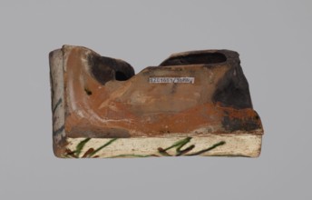 Cornice tile fragments, four; tile cullet; painted with a wavy twirl pattern; 19th century; Hutsul