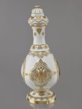 Bottle-shaped vase with a domed lid. Embossed and colorfully painted decoration. Four medallions