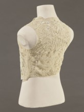Bodice, lace; bodices; women's clothing; fashion. Pattern of rosettes connected by large spiders