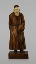 Figurine of a Jew, First Galician Factory of Artistic Faience and Terracotta Pacyków; 1912–1939.