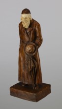 Figurine of a Jew, First Galician Factory of Artistic Faience and Terracotta Pacyków; 1912–1939.