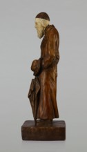 Figurine of a Jew, First Galician Factory of Artistic Faience and Terracotta Pacyków; 1912–1939.