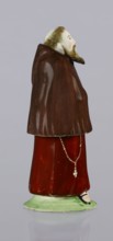 Three-part inkwell in the form of a monk figurine. Consisting of three movable parts: a movable
