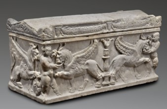 Children's sarcophagus with a depiction of griffins, The lid is shaped like a roof with tympanums;