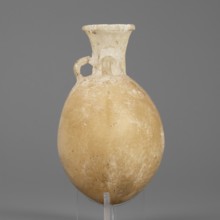 Flask-shaped vessel with a spherical, flattened belly, narrow widening neck and three small
