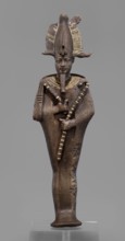 Figurine of the god Osiris; mummy-shaped male figurine; Egyptian art; Egyptian deities; crowns;