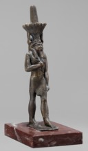 Figurine of the god Nefertum; creator, Egyptian deity Nefertum; Egyptian religion and art; crown