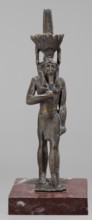 Figurine of the god Nefertum; creator, Egyptian deity Nefertum; Egyptian religion and art; crowns;