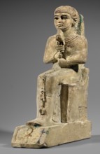 Figurine of the god Ptah. Figurine of the god Ptah sitting on a throne, on a base in the shape of