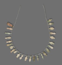 Fragment of a necklace of amulets 26 pieces, Goluchów Greater Poland Voivodeship, necklaces, grave