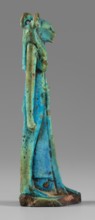 Amulet - figurine of a lion-headed goddess. A lion-headed goddess, in a tripartite wig and a narrow