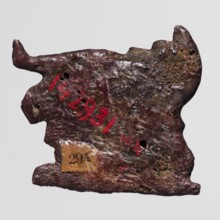 Amulet - mummy lying on a lion-shaped bed; maker, mummification bed iconography; subjects: mummies,
