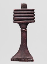 Amulet - djed pillar, A brown glass amulet in the shape of a djed pillar with five crossbars and a