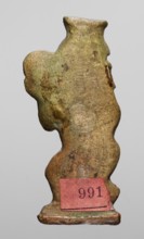 Amulet - dancing god Bes, Bes mythology. Figurine of Bes shown in right half-profile, head turned