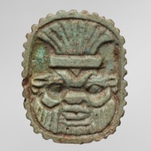 Amulet plaque with the head of the god Bes; plaque amulet, Egyptian deity Bes, wearing crowns. Late