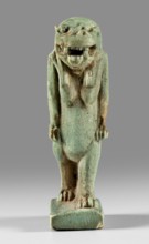 Amulet — figurine of the goddess Toeris in the form of a pregnant hippopotamus standing on lion