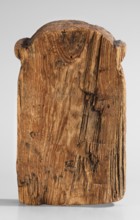Magical stele topped with the mask of the god Bes. Magical stele cippus depicting in the lower