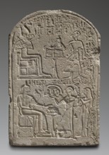 Votive stela of the priest Peraaerneheh. The stele decoration is arranged in two registers. The
