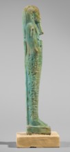 Ushabti of Semen-Ptah-Psamtyk. Wigs, funerary figurine mummy-shaped, hieroglyphs, beards facial