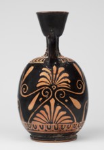 Red-figure aryballus lekythos with a scene of Aphrodite's toilet, On the belly: Aphrodite crouching