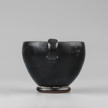 Black-finished skyphos, Type B. Thin-walled skyphos with a deep bowl and annular foot. One handle