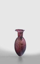 Amphora, unknown eastern workshop; Translucent, manganese glass; elongated ovoid body with