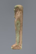 Ushabti, unknown creator; Hor-em-saf ca. 664–525 BC. Mummy-shaped figurine made of green faience.