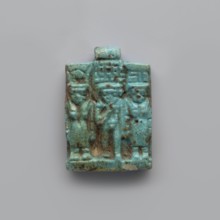 Amulet – plaque with a triad of deities, Harpocrates Horus, Isis, Nephthys. Amulet in the shape of