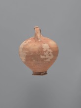 Jug, unknown Aswan workshop. Jug with a rounded rim, a narrow and upwardly flaring neck with a